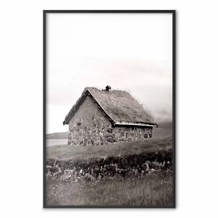 Visserhut - landschap van een veld en een stenen huis tegen een heldere lucht