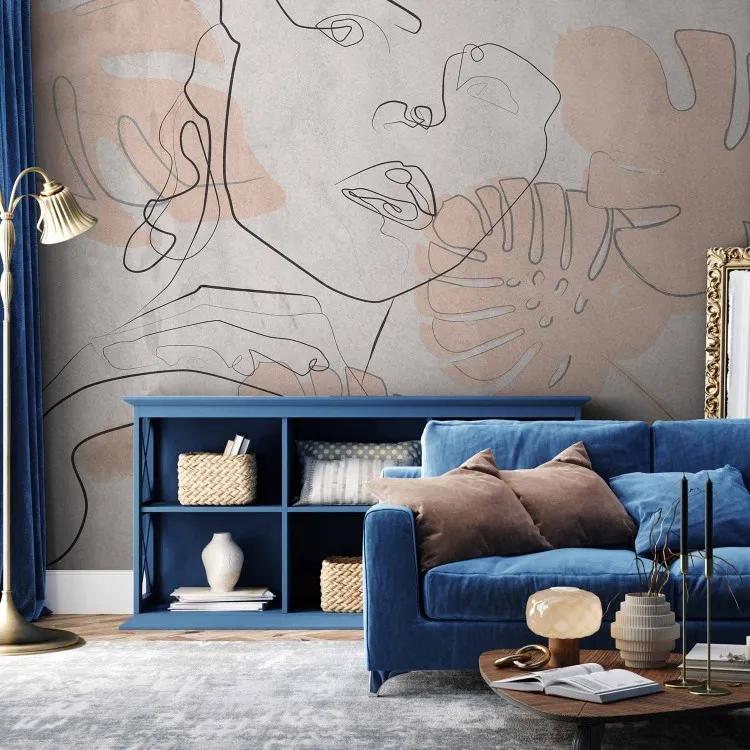 Delicate abstractie - contour van een vrouwelijk gezicht op een achtergrond met roze bladeren